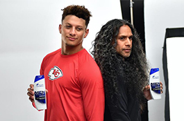 1UP Sports Marketing client Patrick Mahomes poses with Troy Polamalu for a Head and Shoulders commercial