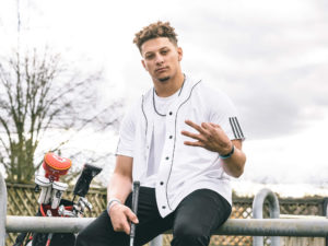 1UP Sports Marketing client Patrick Mahomes flashing the adidas "Three Fingers"