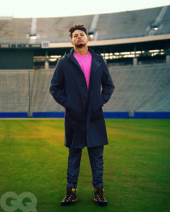 1UP Sports Marketing client Patrick Mahomes standing in the middle of a football field for a GQ photo shoot