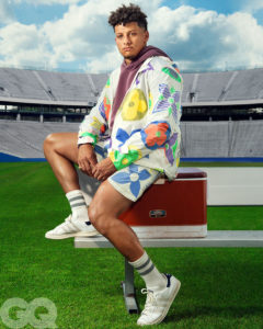 1UP Sports Marketing client Patrick Mahomes sits on a cooler for a GQ photoshoot