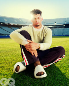 1UP Sports Marketing client Patrick Mahomes wears a sweater and sweatpants for a GQ photoshoot