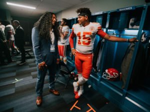 1UP Sports Marketing client Patrick Mahomes chats with Troy Polamalu in a locker room