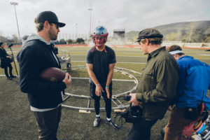 1UP Sports Marketing client Patrick Mahomes talks things over with the director during a video shoot