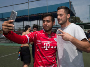 1UP Sports Marketing clients Danny Amendola posing for a selfie with a Mexican fan