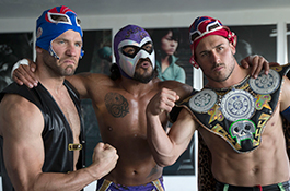1UP Sports Marketing clients Danny Amendola and Julian Edelman pose with a Mexican wrestler in full wrestling outfits