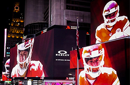 1UP Sports Marketing client Patrick Mahomes on the big video screens at Times Square as part of an Oakley ad campaign