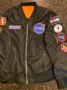 Jacket of 1UP Sports Marketing client Bradley Chubb, featuring "Astronaut" and Snickers" patches.